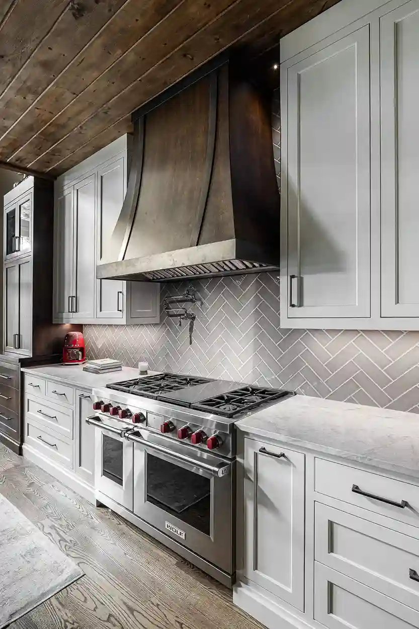 This image has been uploaded previously. Here is the alt text provided before:  Luxury kitchen with custom wood cabinets and modern appliances by Michael James Remodeling.